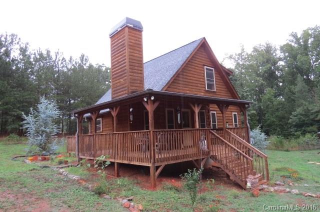 7275 Poors Ford Road Rutherfordton, NC 28139 - Photo 21 of 24 a view of a house with a yard and deck