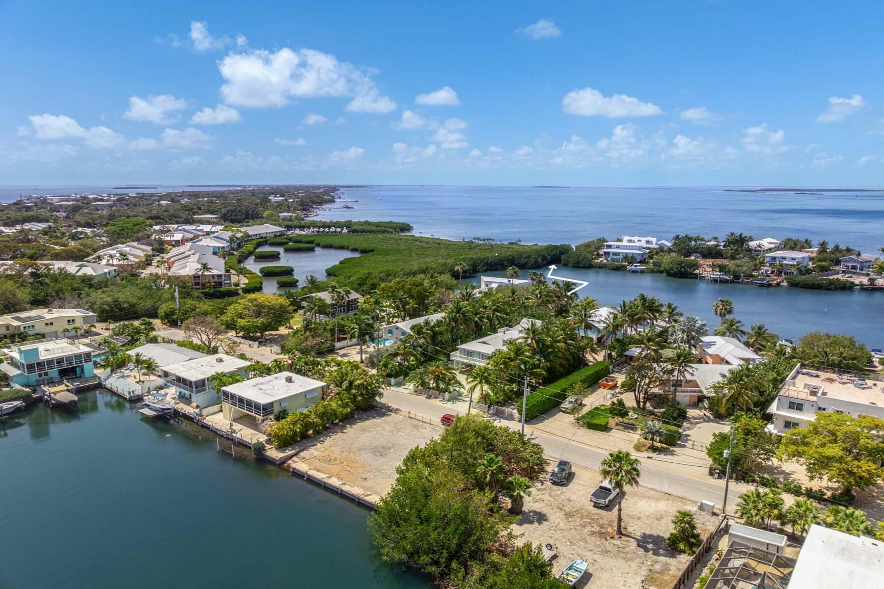 79 Jean La Fitte Drive Key Largo, FL 33037 - Photo 62 of 62 an aerial view of residential houses with outdoor space