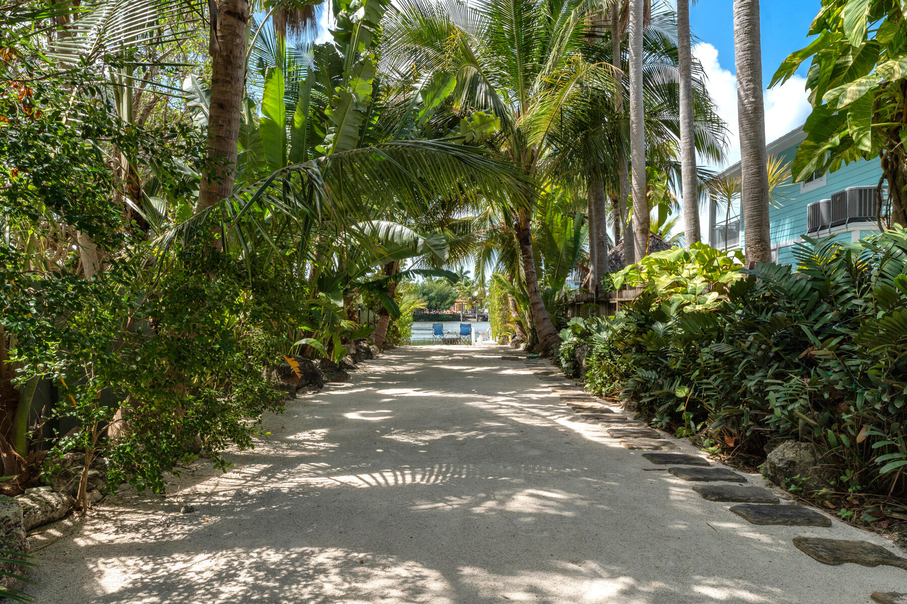 79 Jean La Fitte Drive Key Largo, FL 33037 - Photo 8 of 62 Picturesque lane lined by mature palms