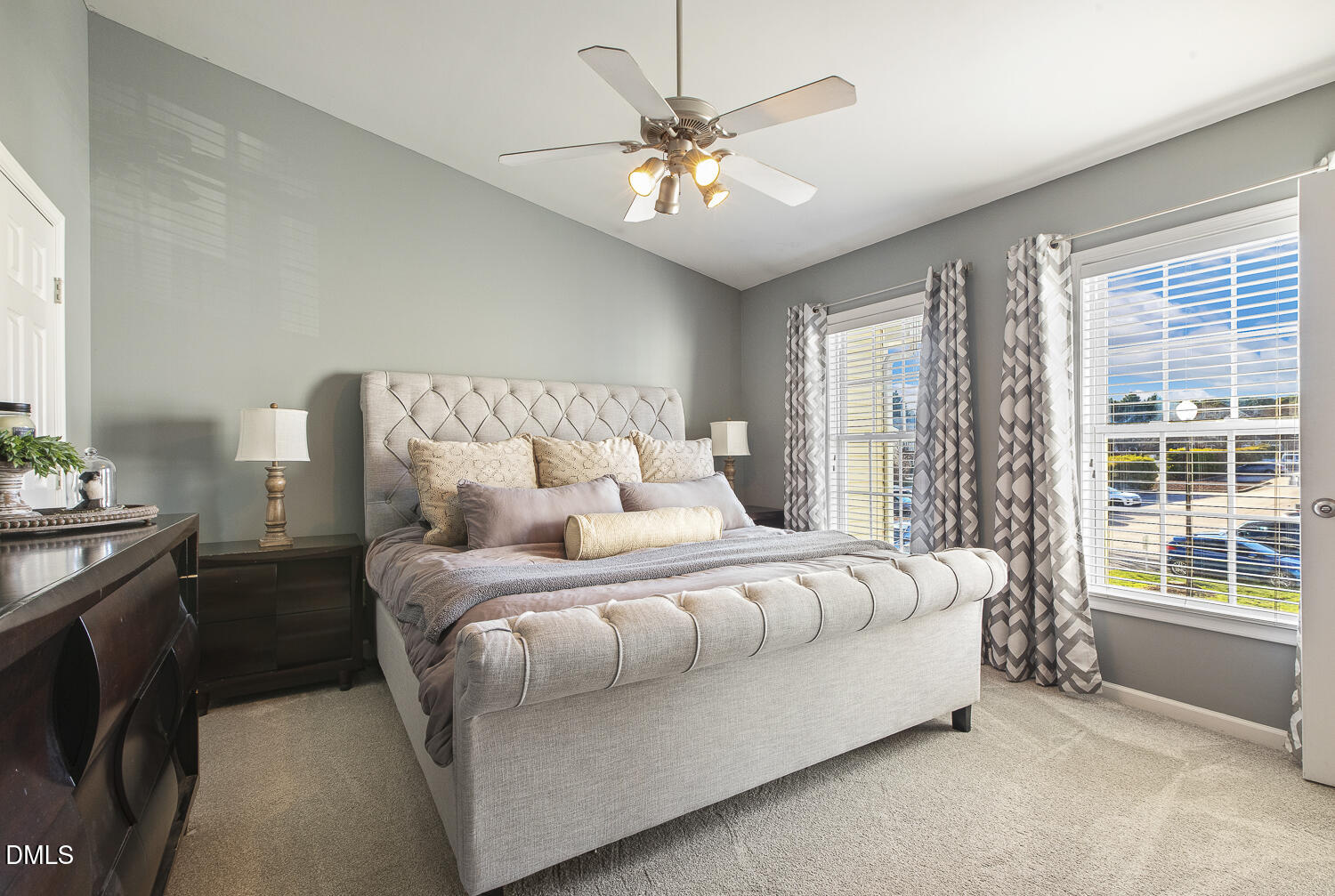 2131 Piney Brook Road, Unit 102 Raleigh, NC 27614 - Photo 13 of 23 a bedroom with bed and a chandelier