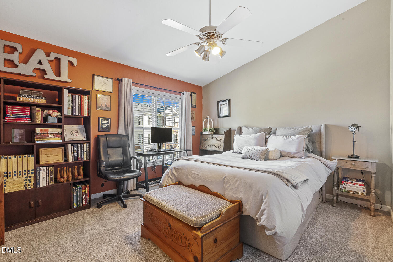 2131 Piney Brook Road, Unit 102 Raleigh, NC 27614 - Photo 17 of 23 a bedroom with a bed a bookshelf and a bookshelf