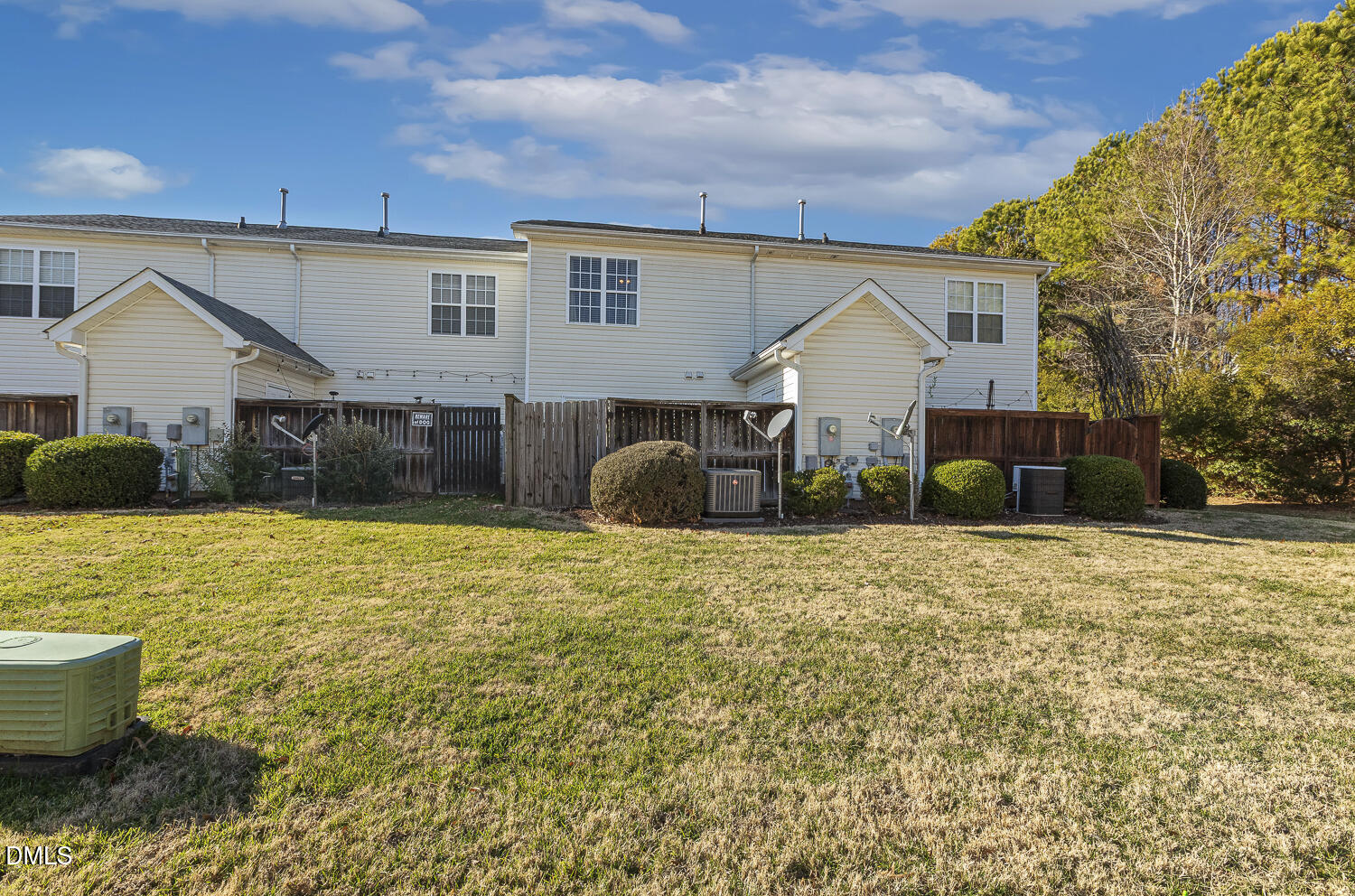 2131 Piney Brook Road, Unit 102 Raleigh, NC 27614 - Photo 21 of 23 a front view of a house with a yard
