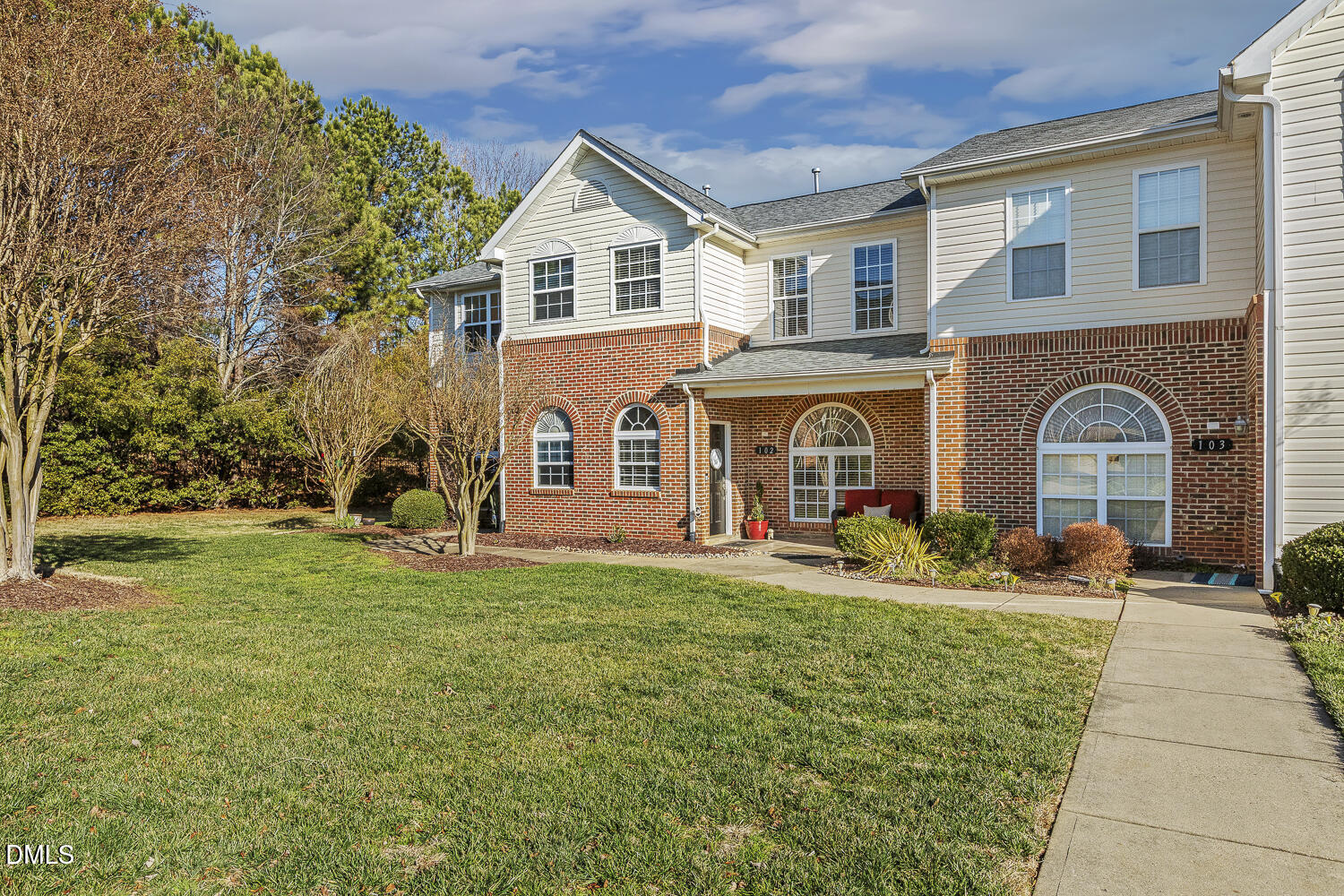2131 Piney Brook Road, Unit 102 Raleigh, NC 27614 - Photo 2 of 23 a front view of house with yard