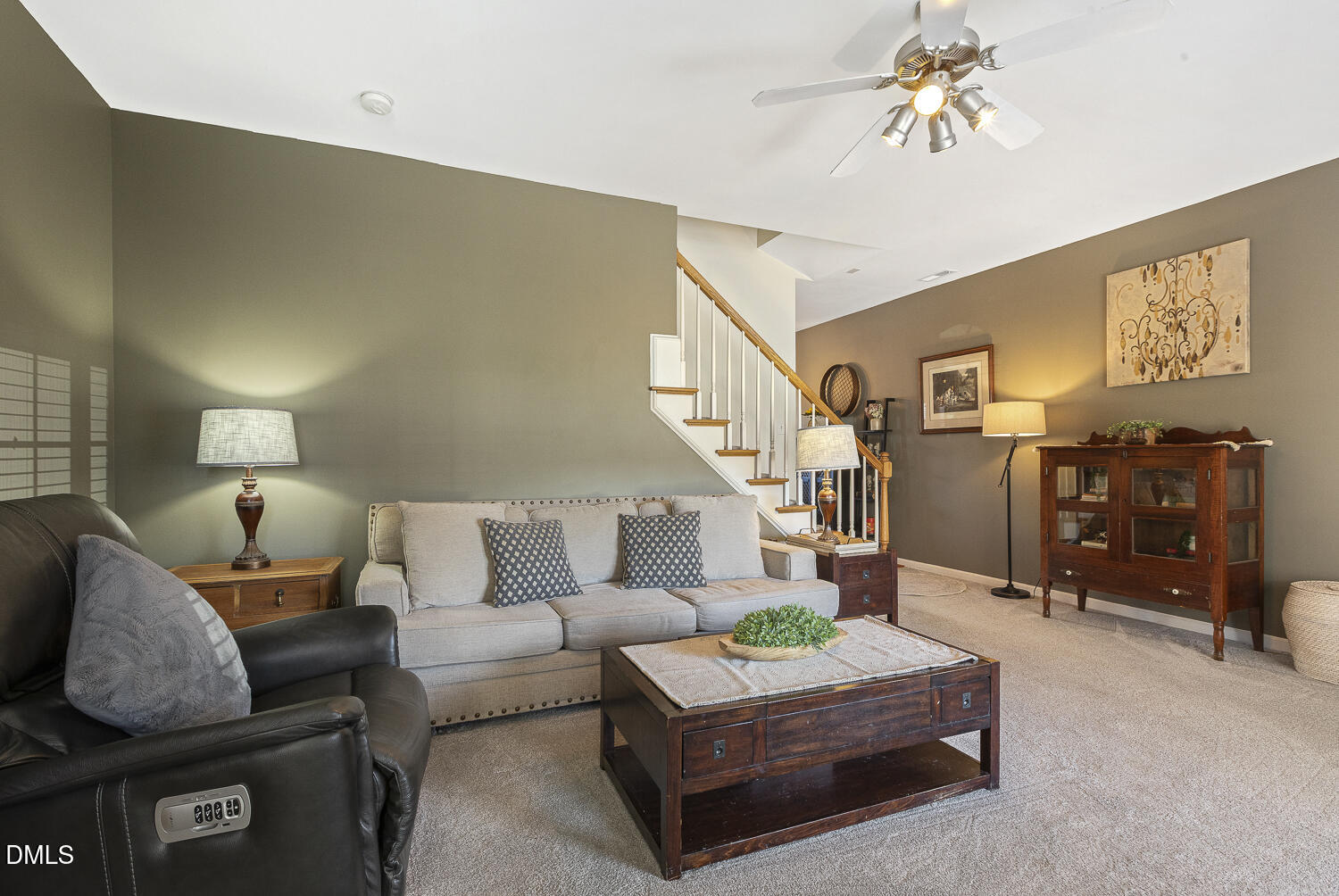 2131 Piney Brook Road, Unit 102 Raleigh, NC 27614 - Photo 4 of 23 a living room with furniture and wooden floor