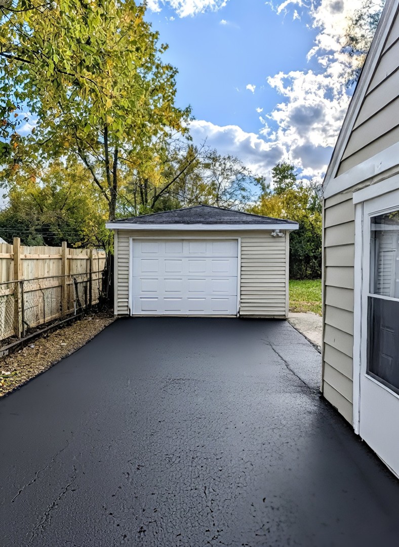 267 Arrowhead Street Park Forest, IL 60466 - Photo 2 of 12 a view of a garage