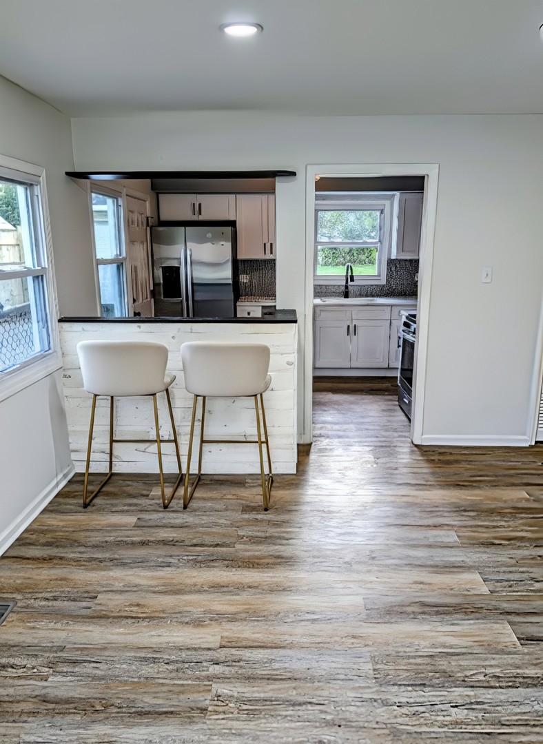 267 Arrowhead Street Park Forest, IL 60466 - Photo 6 of 12 a living room with furniture and a window