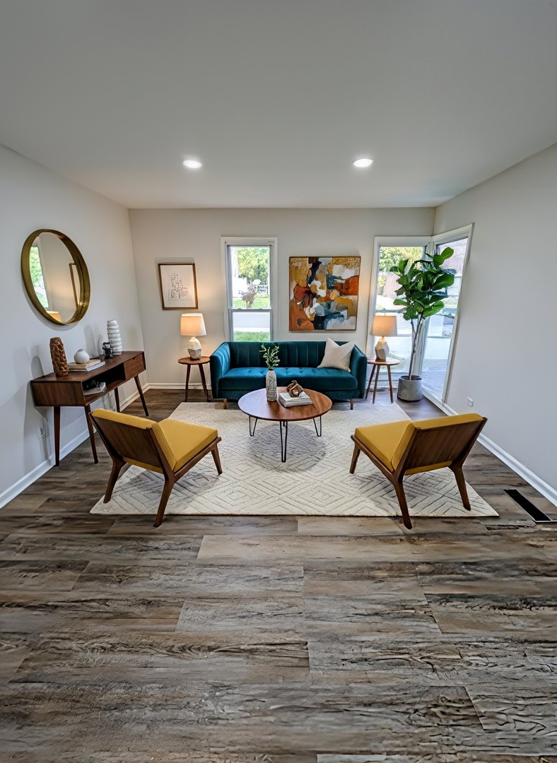 267 Arrowhead Street Park Forest, IL 60466 - Photo 7 of 12 a living room with furniture and a fireplace