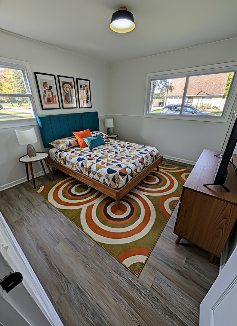 267 Arrowhead Street Park Forest, IL 60466 - Photo 8 of 12 a bedroom with furniture and window