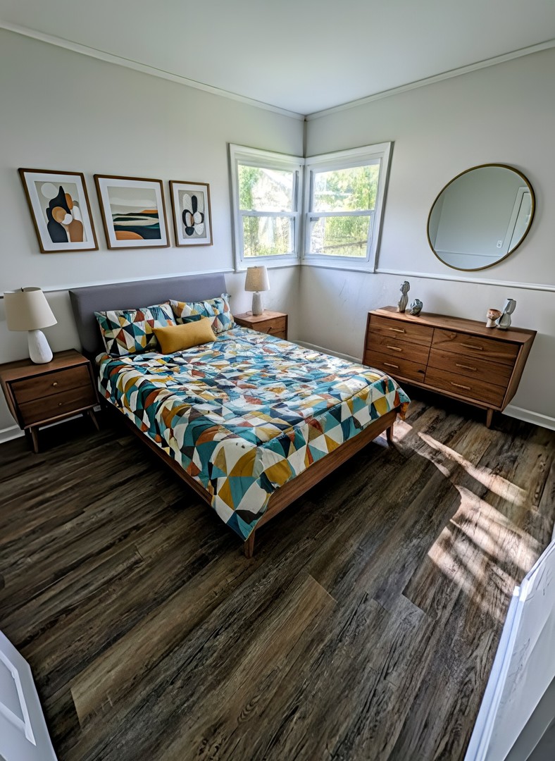 267 Arrowhead Street Park Forest, IL 60466 - Photo 9 of 12 a bedroom with a bed and window