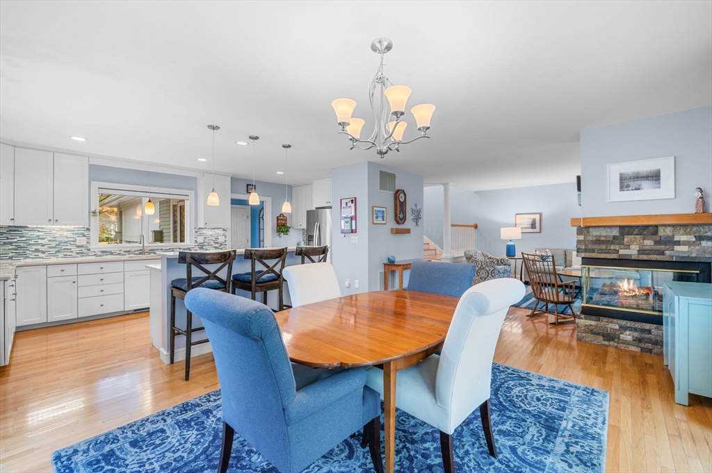 1 Court Lane Ipswich, MA 01938 - Photo 14 of 40 a view of a dining room with furniture and wooden floor