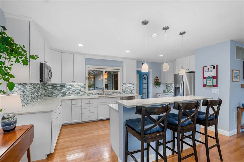 1 Court Lane Ipswich, MA 01938 - Photo 19 of 40 a kitchen with a table and chairs in it