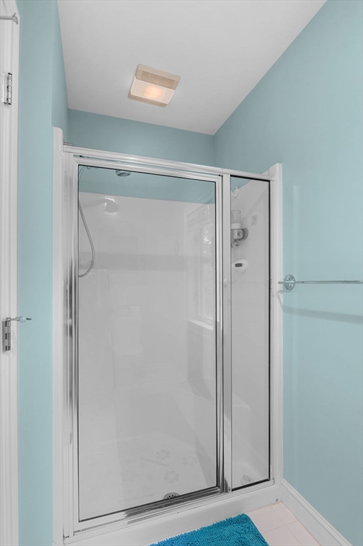 1 Court Lane Ipswich, MA 01938 - Photo 26 of 40 a bathroom with a glass shower door