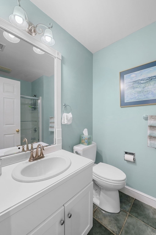 1 Court Lane Ipswich, MA 01938 - Photo 29 of 40 a bathroom with a toilet sink and mirror