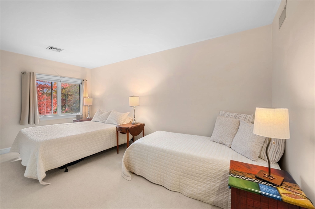 1 Court Lane Ipswich, MA 01938 - Photo 31 of 40 a bedroom with two beds and lamp