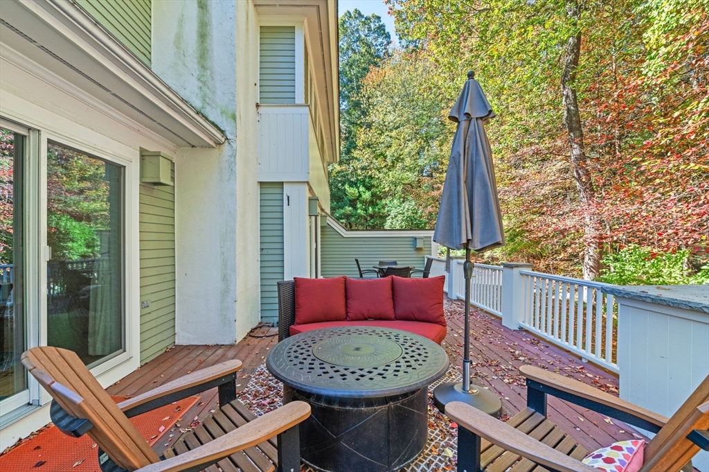 1 Court Lane Ipswich, MA 01938 - Photo 35 of 40 a view of a two chairs and table in the balcony