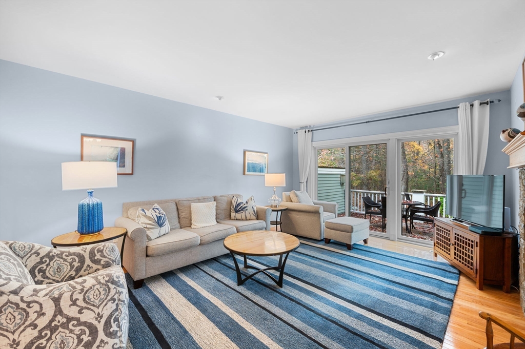1 Court Lane Ipswich, MA 01938 - Photo 8 of 40 a living room with furniture and a lamp