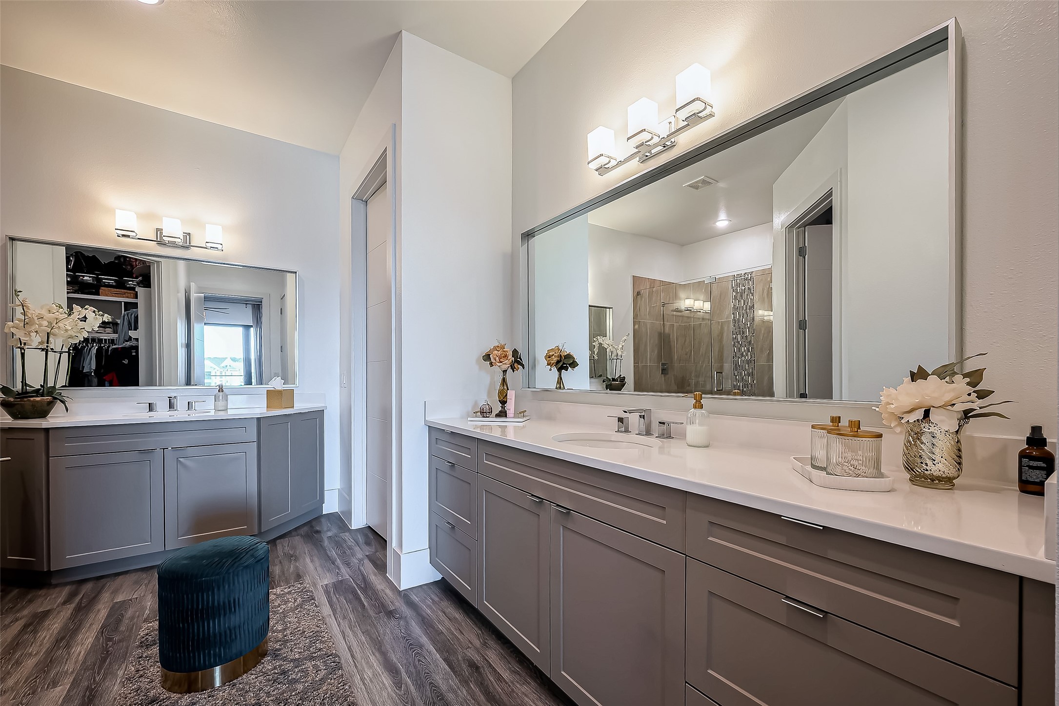199 Waterpoint Court, Unit 302 Conroe, TX 77356 - Photo 10 of 20 Spa like primary ensuite bath complete with dual sinks and an oversized walk in shower. A true retreat after a day on the water.