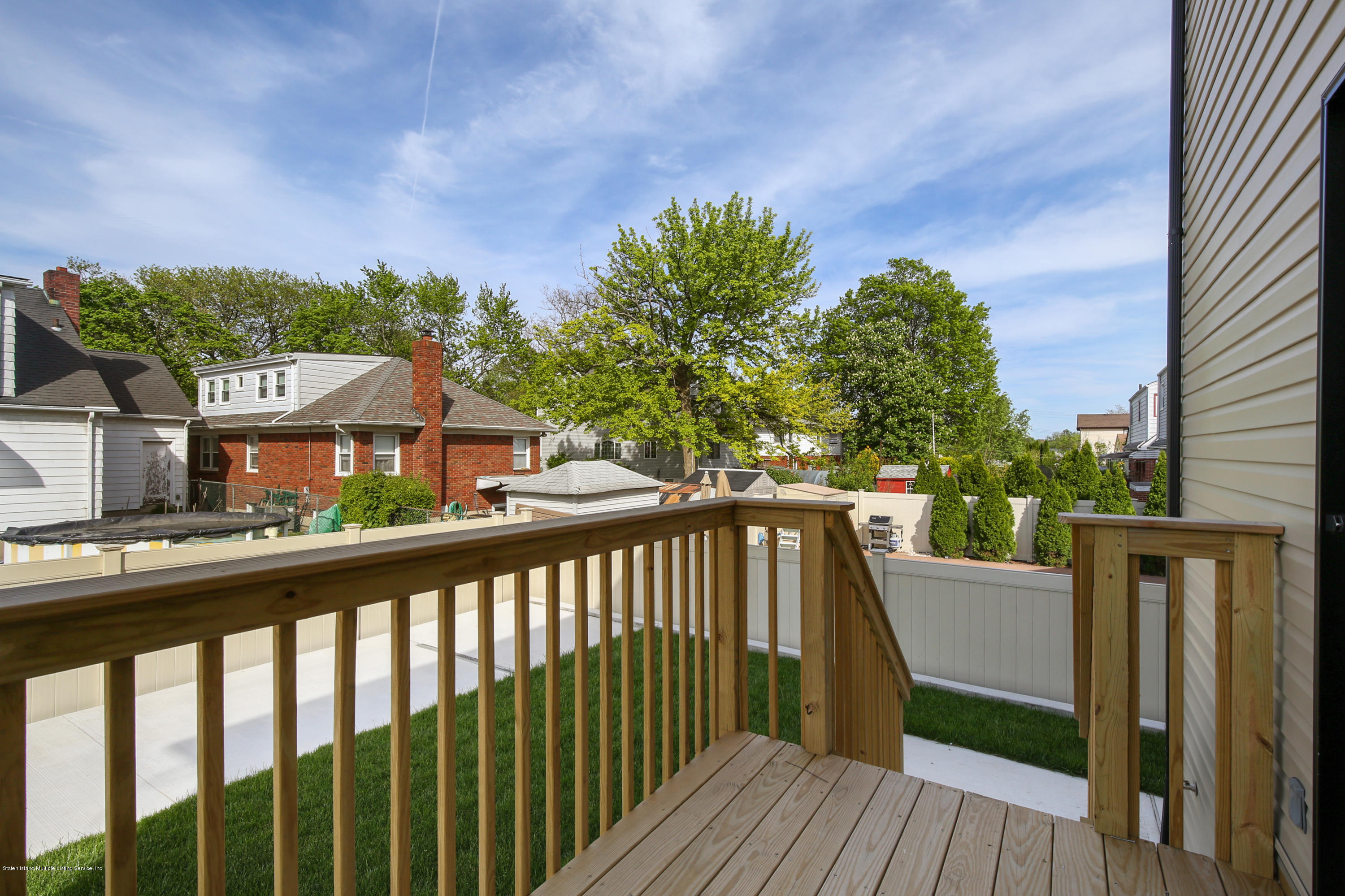 232 8 Street Staten Island, NY 10306 - Photo 24 of 25 a view of a street from a balcony