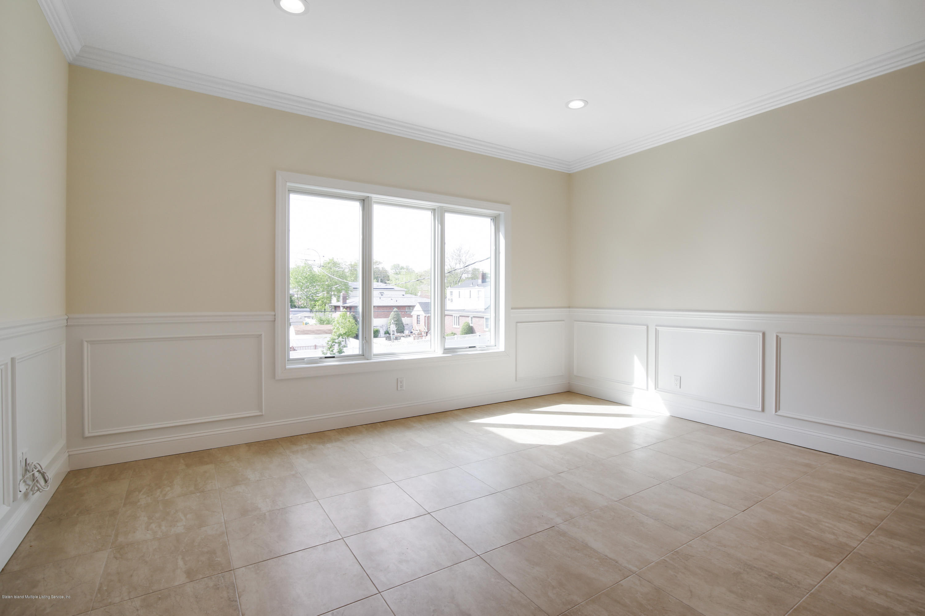 232 8 Street Staten Island, NY 10306 - Photo 3 of 25 an empty room with windows