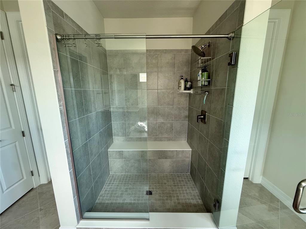 8441 Pk Clf Way Orlando, FL 32836 - Photo 37 of 59 a bathroom with a shower