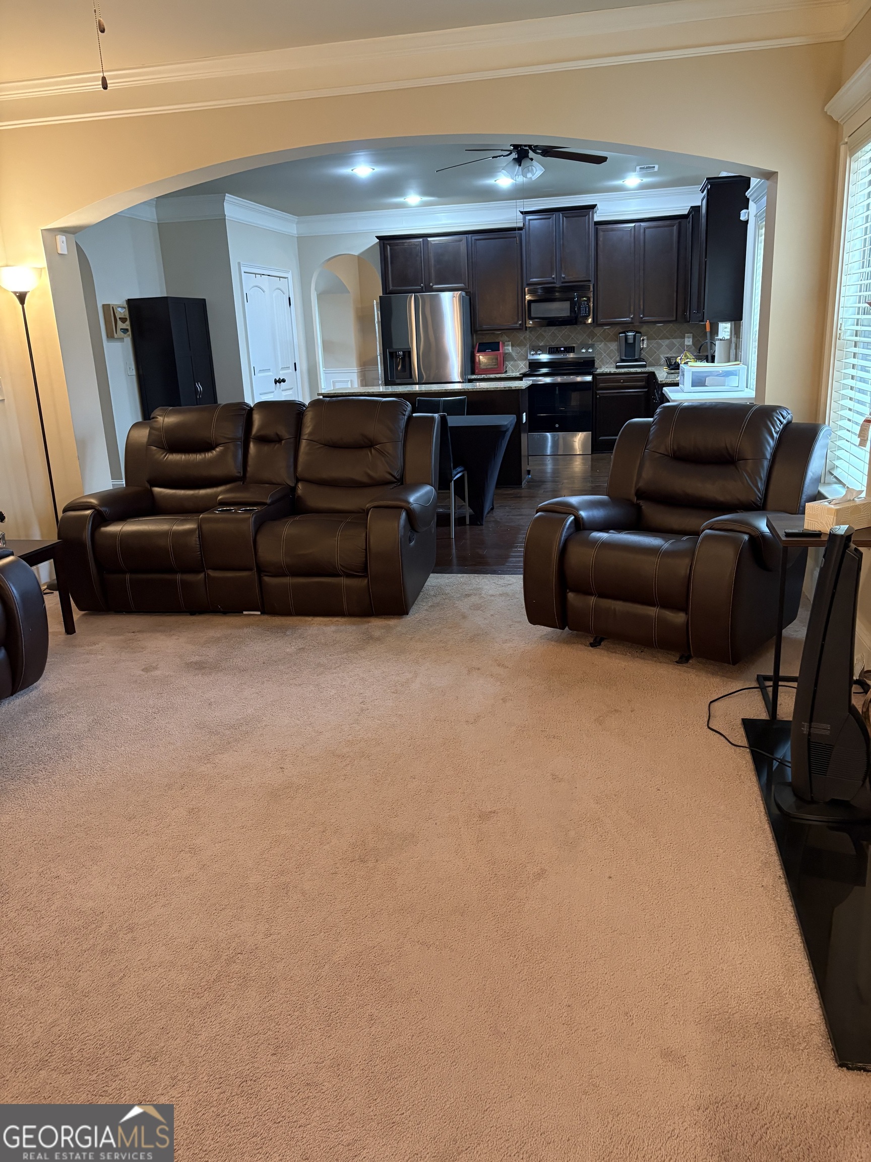 208 Deodar Lane Hampton, GA 30228 - Photo 11 of 28 a living room with furniture and a flat screen tv