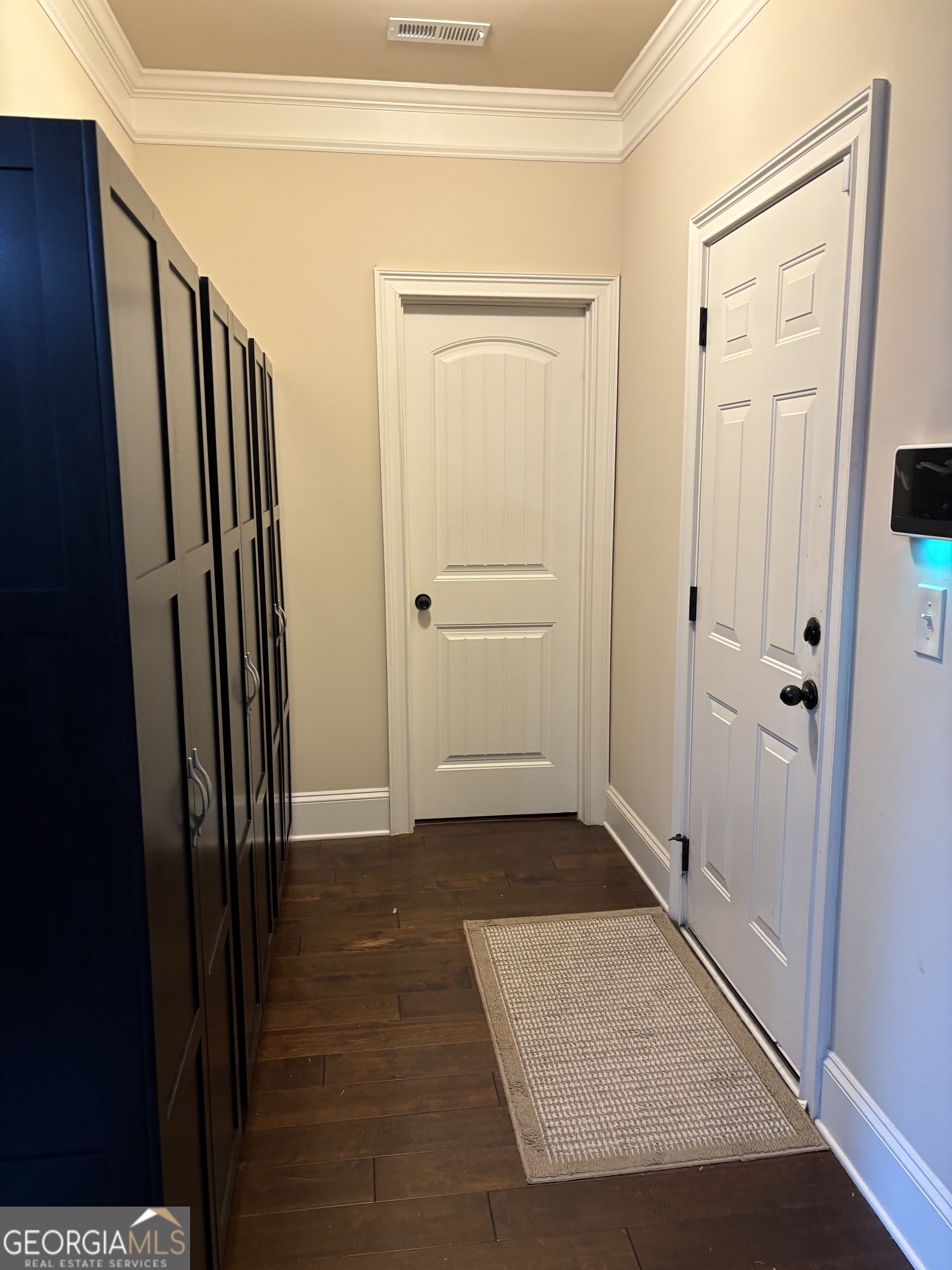 208 Deodar Lane Hampton, GA 30228 - Photo 12 of 28 an entryway with a hardwood floor