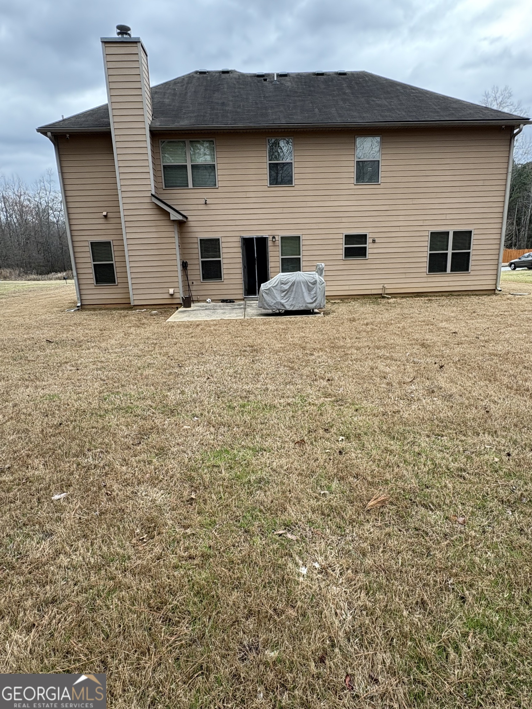 208 Deodar Lane Hampton, GA 30228 - Photo 28 of 28 a house view with a outdoor space