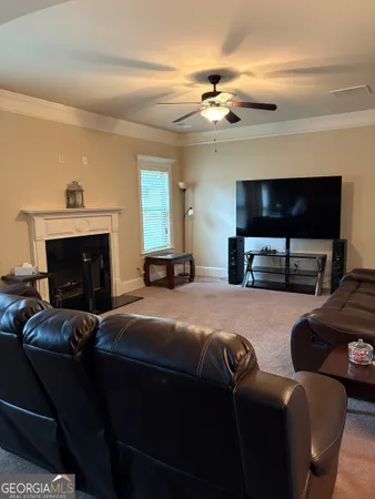 a bedroom with furniture and a fireplace