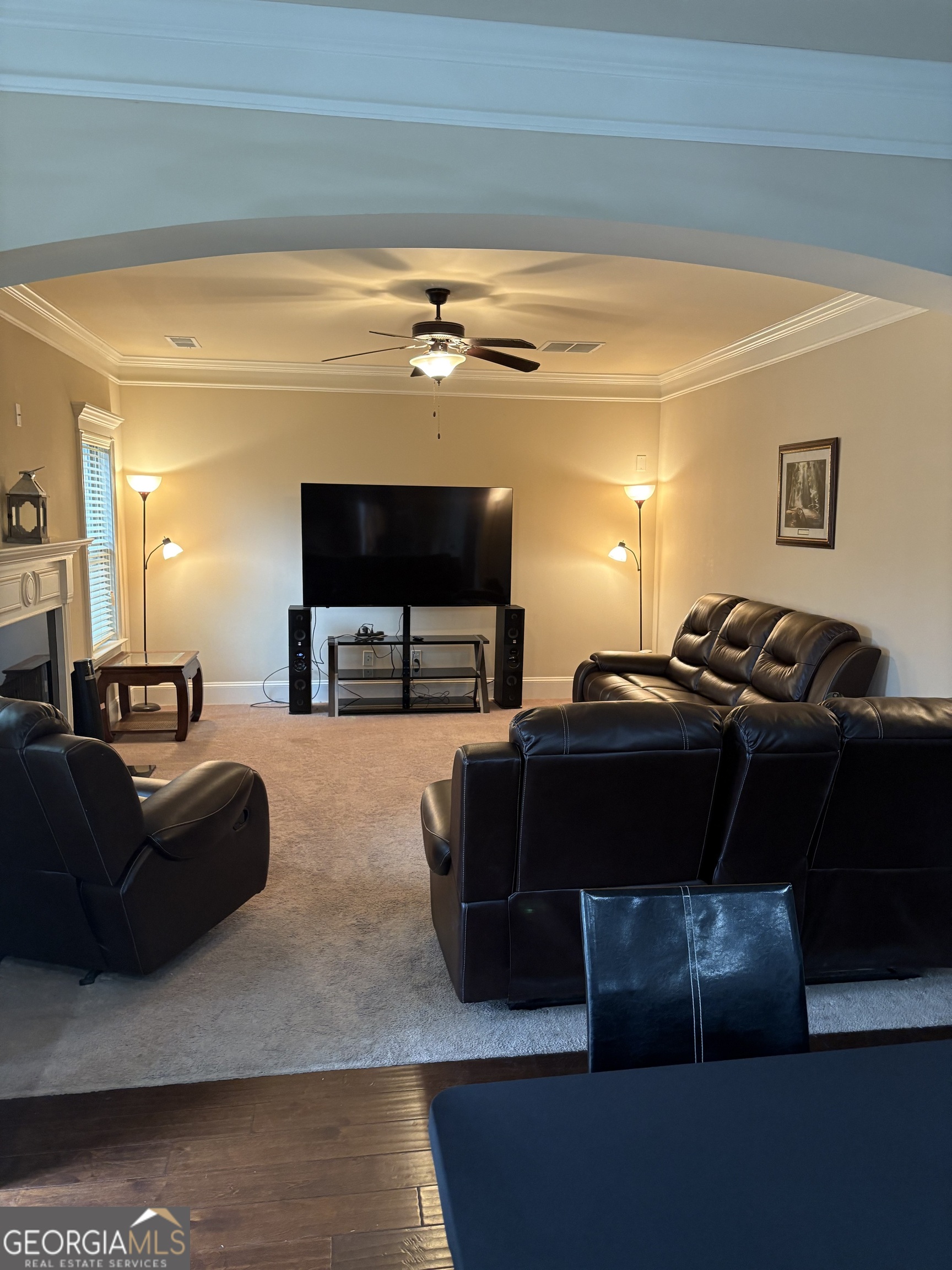 208 Deodar Lane Hampton, GA 30228 - Photo 10 of 28 a living room with furniture and a flat screen tv
