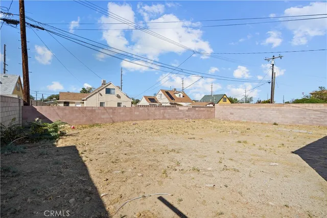 an aerial view of a kitchen with stainless steel appliances