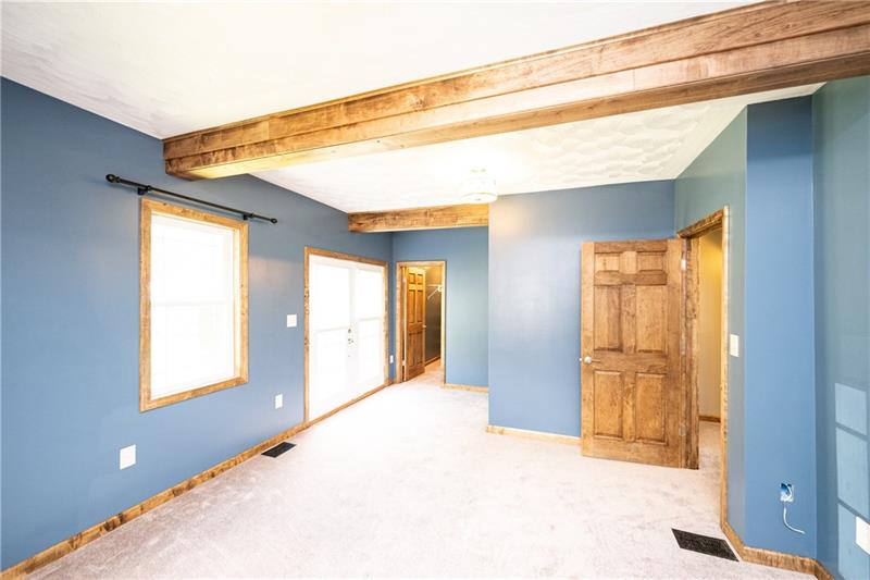 1810 Glen Road Aliquippa, PA 15001 - Photo 10 of 24 The hand finished beams in the master bedroom add a rustic charm to this roomy space.