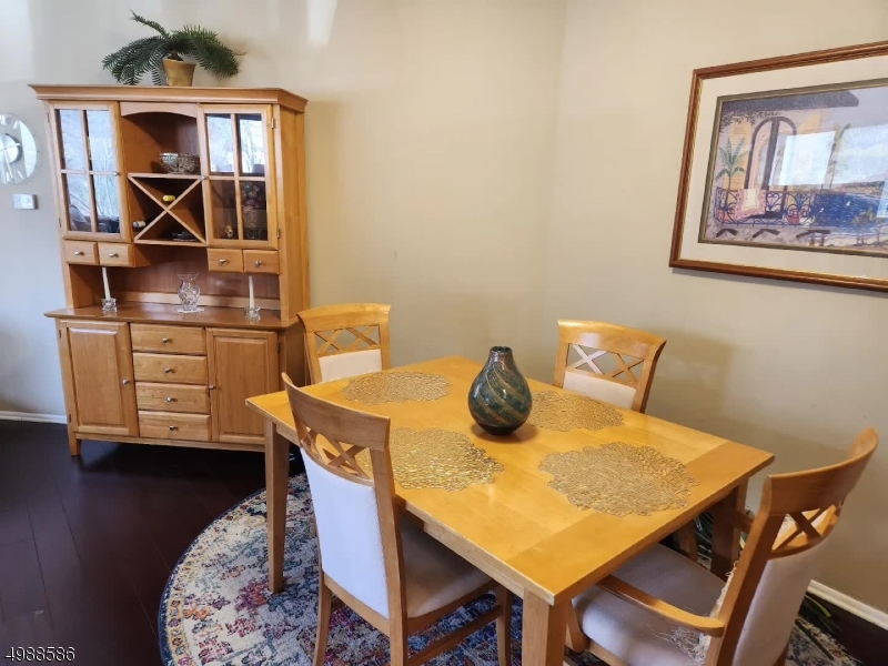 64 Sycamore Court Bernards, NJ 07920 - Photo 11 of 27 a dining room with furniture and wooden floor