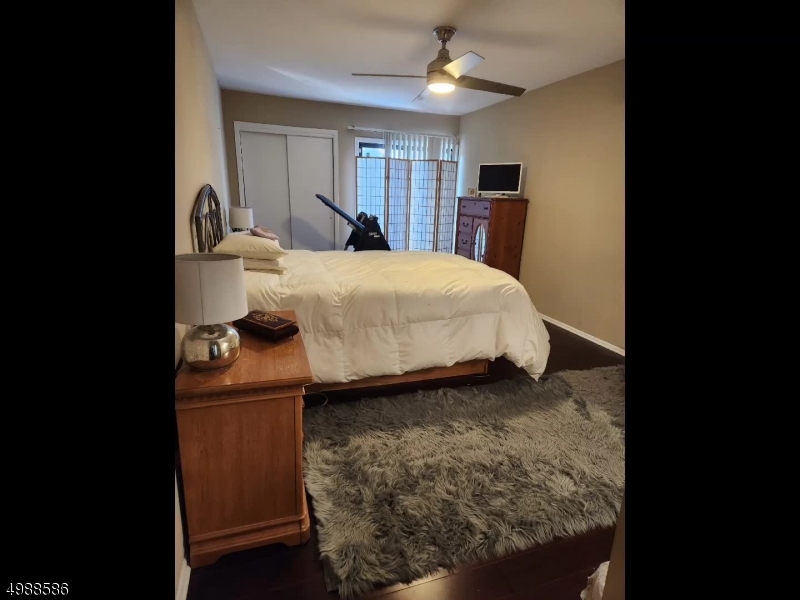 64 Sycamore Court Bernards, NJ 07920 - Photo 18 of 27 a bed room with a bed and a window