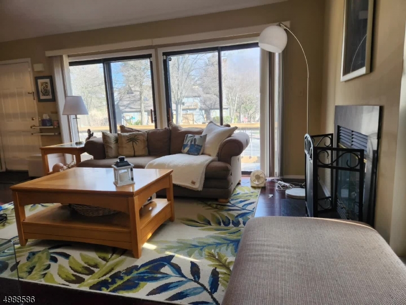 64 Sycamore Court Bernards, NJ 07920 - Photo 2 of 27 a living room with furniture and a large window