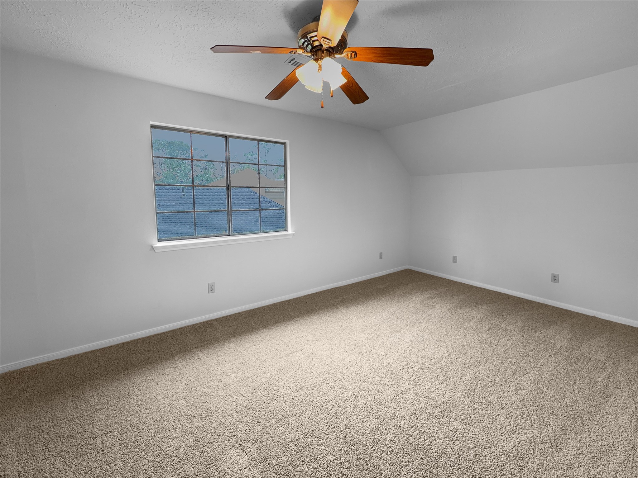 2130 Medway Drive Spring, TX 77386 - Photo 15 of 21 an empty room with a window and a fan