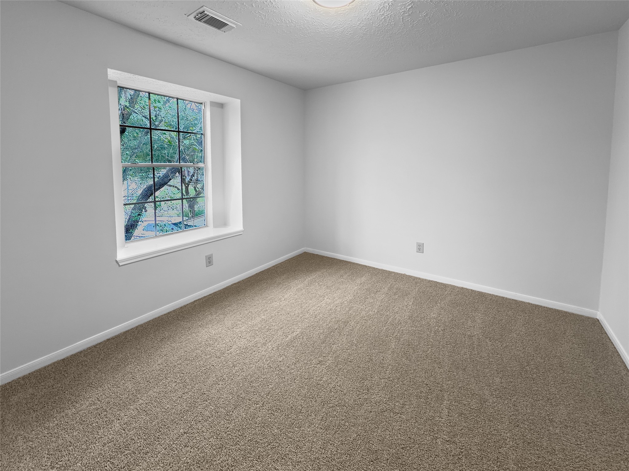 2130 Medway Drive Spring, TX 77386 - Photo 19 of 21 an empty room with a window
