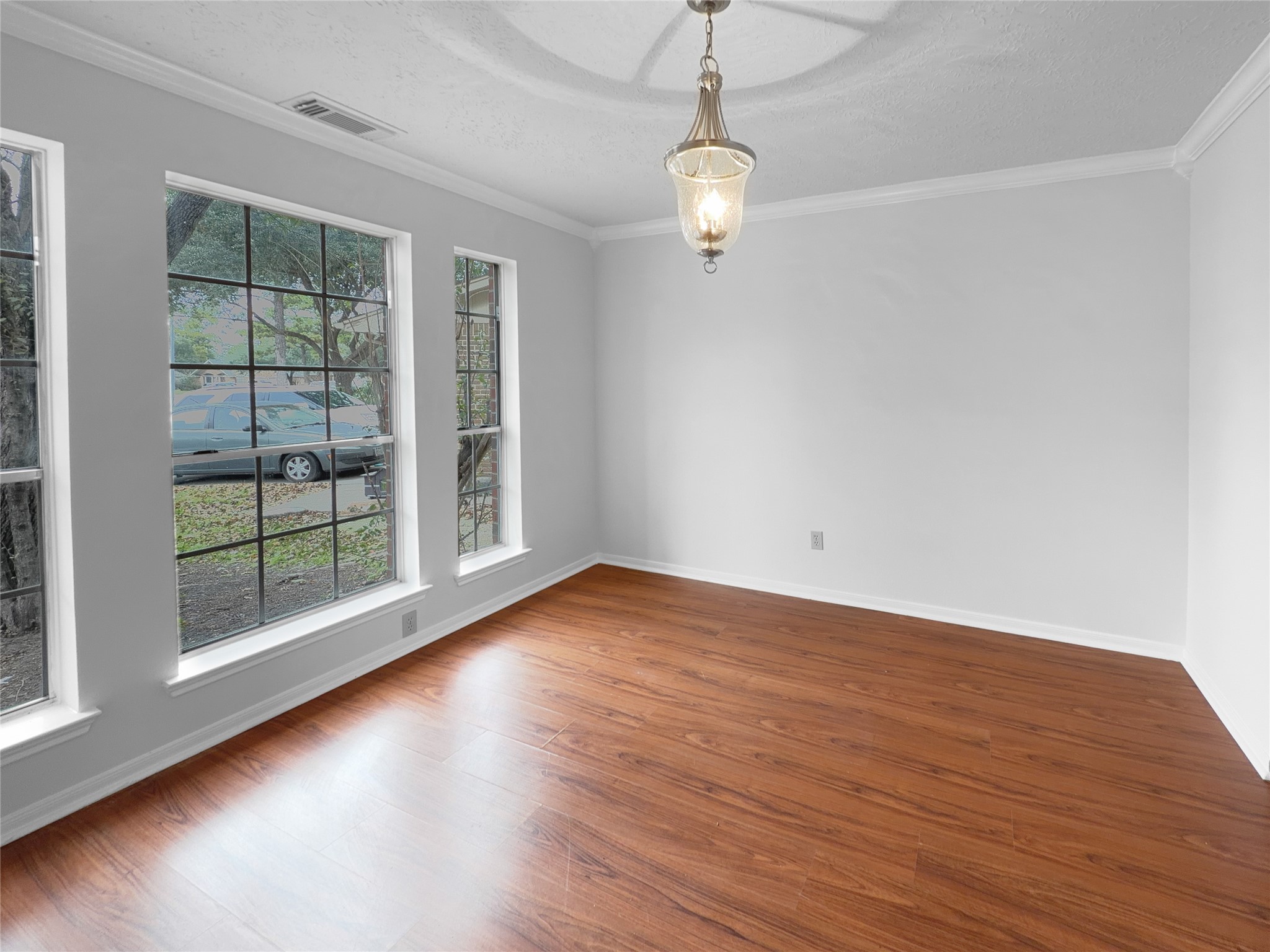 2130 Medway Drive Spring, TX 77386 - Photo 9 of 21 a view of room with window and wooden floor