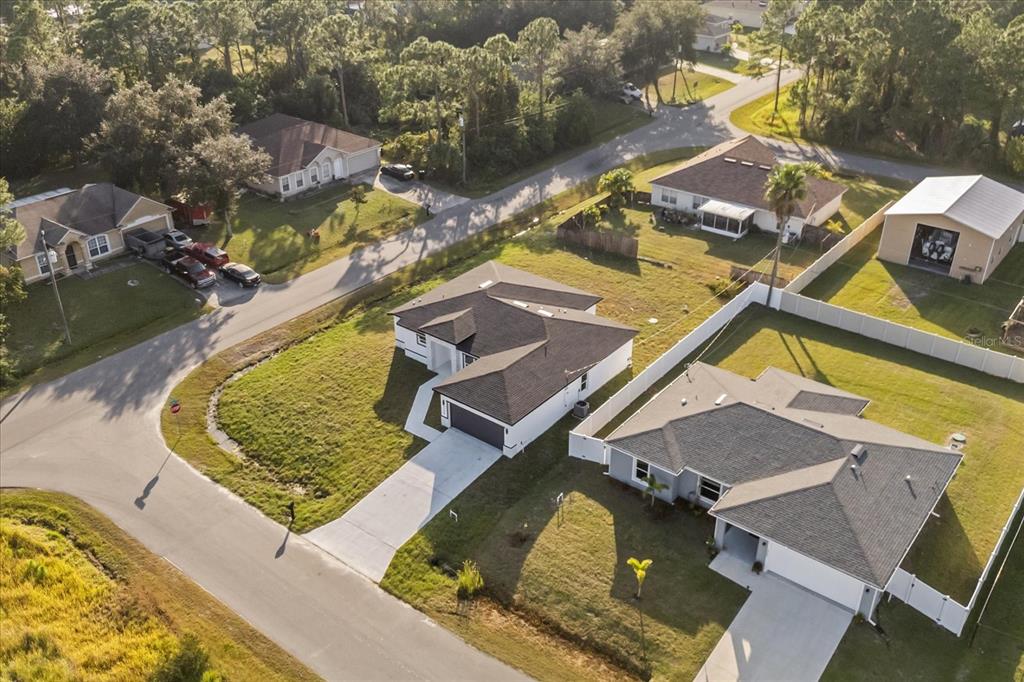 2798 Gainesville Road Southeast Palm Bay, FL 32909 - Photo 25 of 35 an aerial view of residential houses with outdoor space