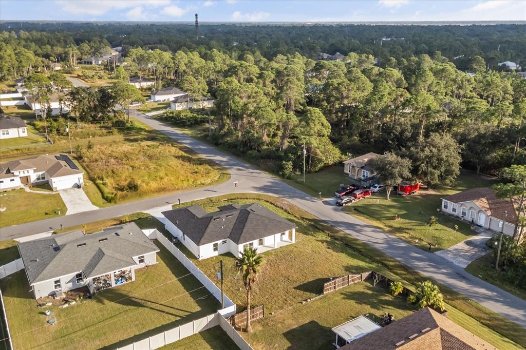 2798 Gainesville Road Southeast Palm Bay, FL 32909 - Photo 26 of 35 an aerial view of residential houses with outdoor space