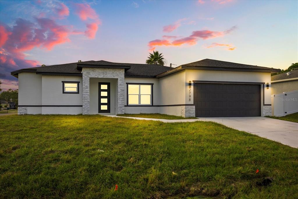 2798 Gainesville Road Southeast Palm Bay, FL 32909 - Photo 3 of 35 a bathroom with a sink and yard