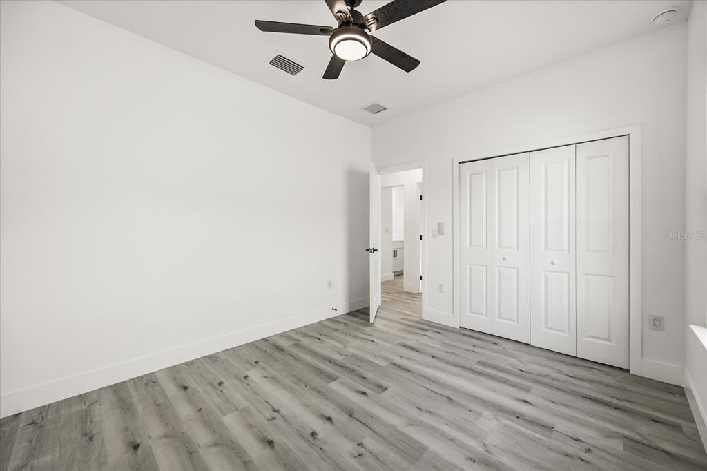 2798 Gainesville Road Southeast Palm Bay, FL 32909 - Photo 34 of 35 a view of empty room with wooden floor