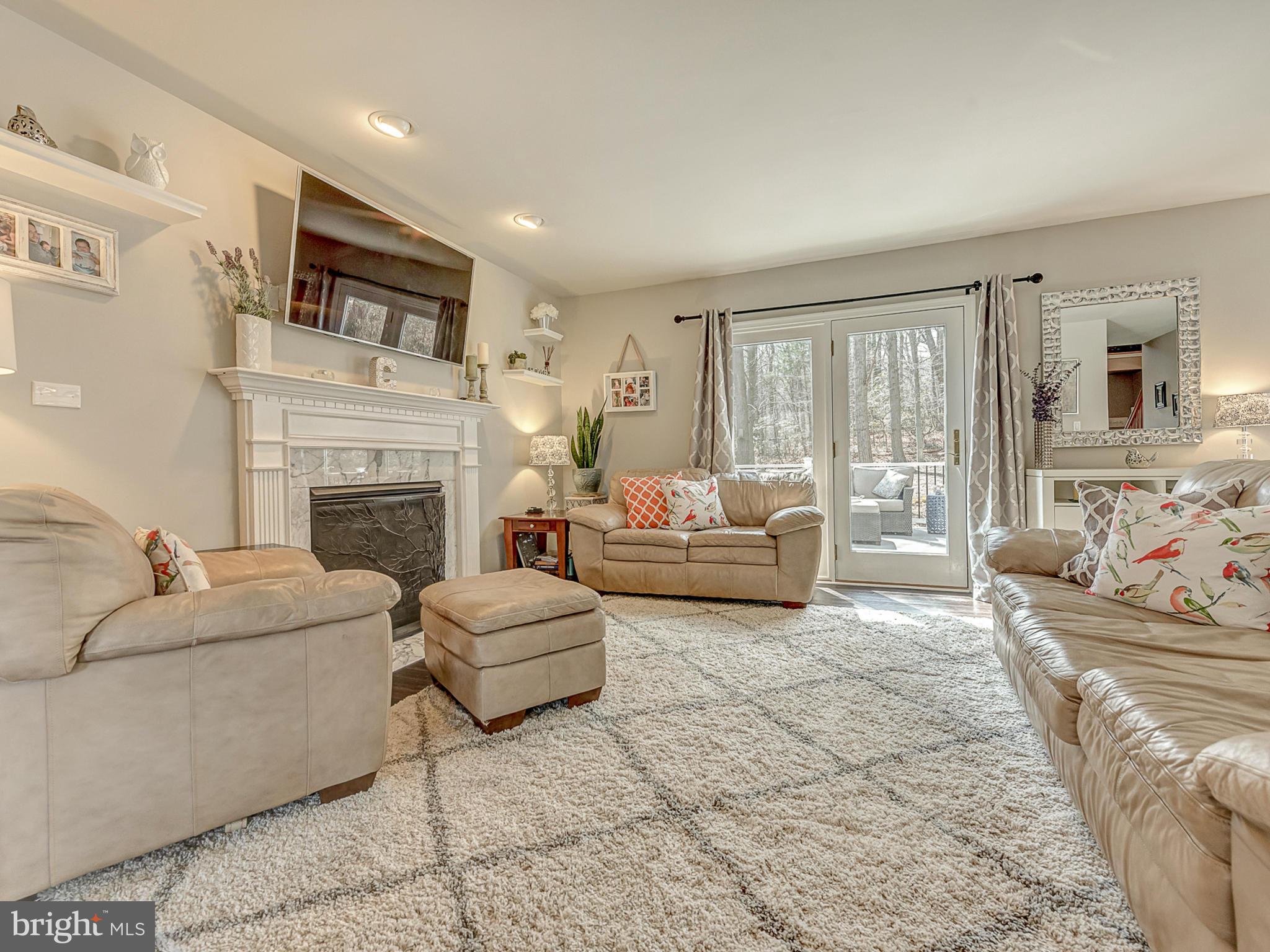 3364 Basford Road Frederick, MD 21703 - Photo 11 of 30 a living room with furniture and a fireplace