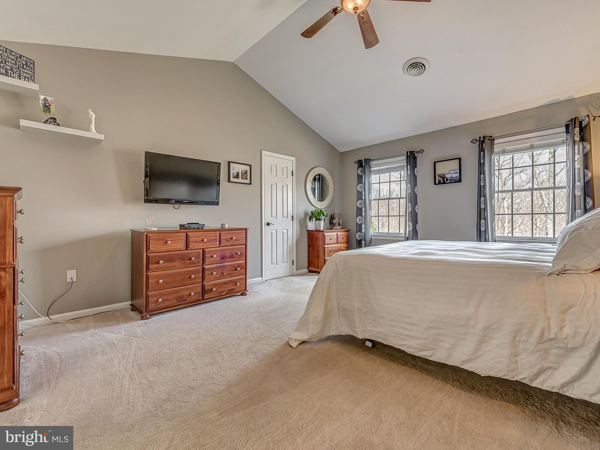 3364 Basford Road Frederick, MD 21703 - Photo 14 of 30 a bed room with a bed and a television