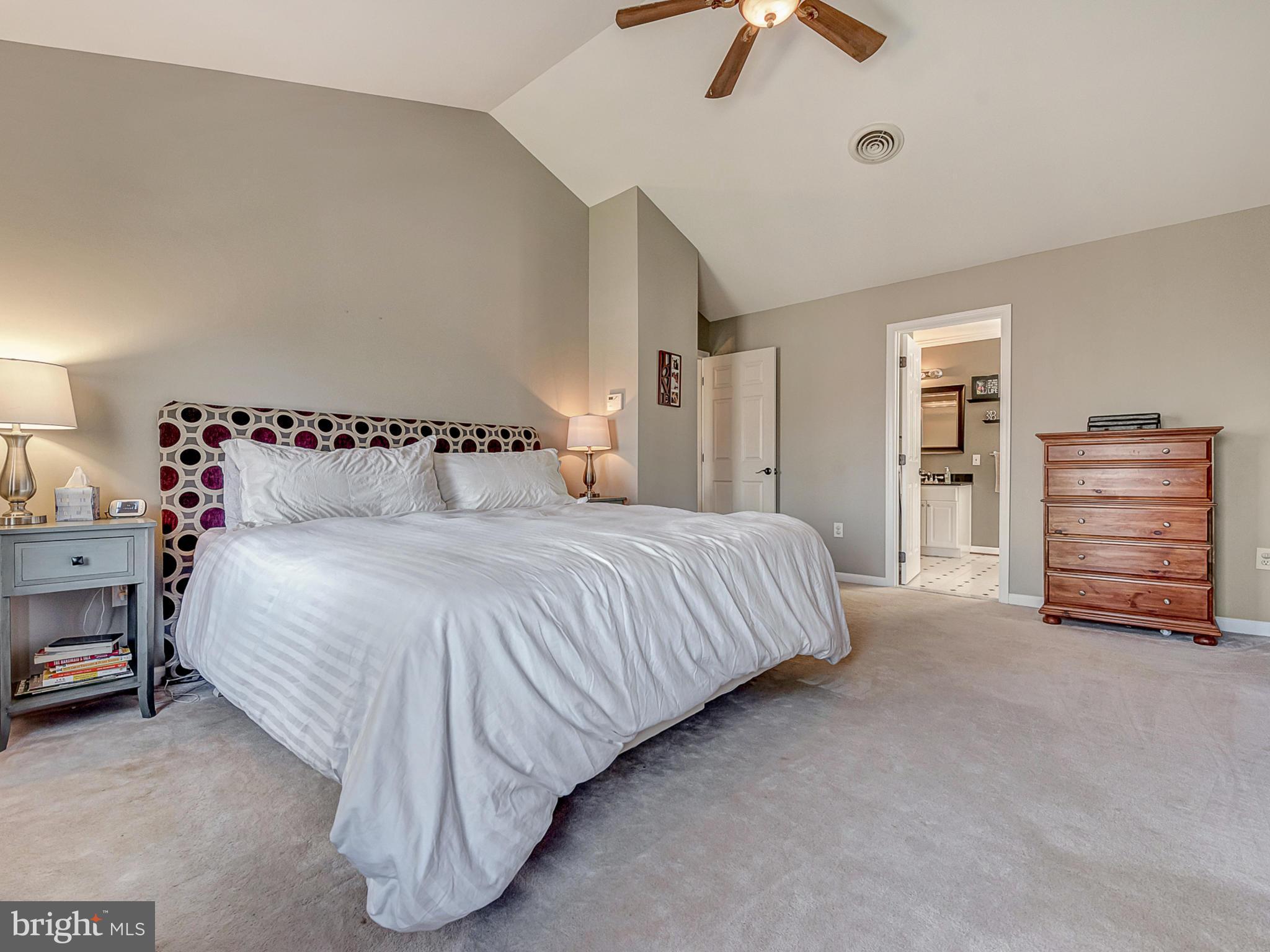 3364 Basford Road Frederick, MD 21703 - Photo 17 of 30 a bedroom with a bed and a chair
