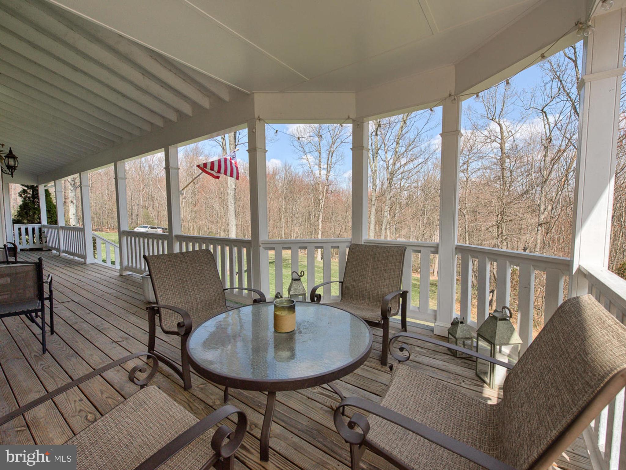3364 Basford Road Frederick, MD 21703 - Photo 3 of 30 a dining room with furniture a chandelier and wooden floor