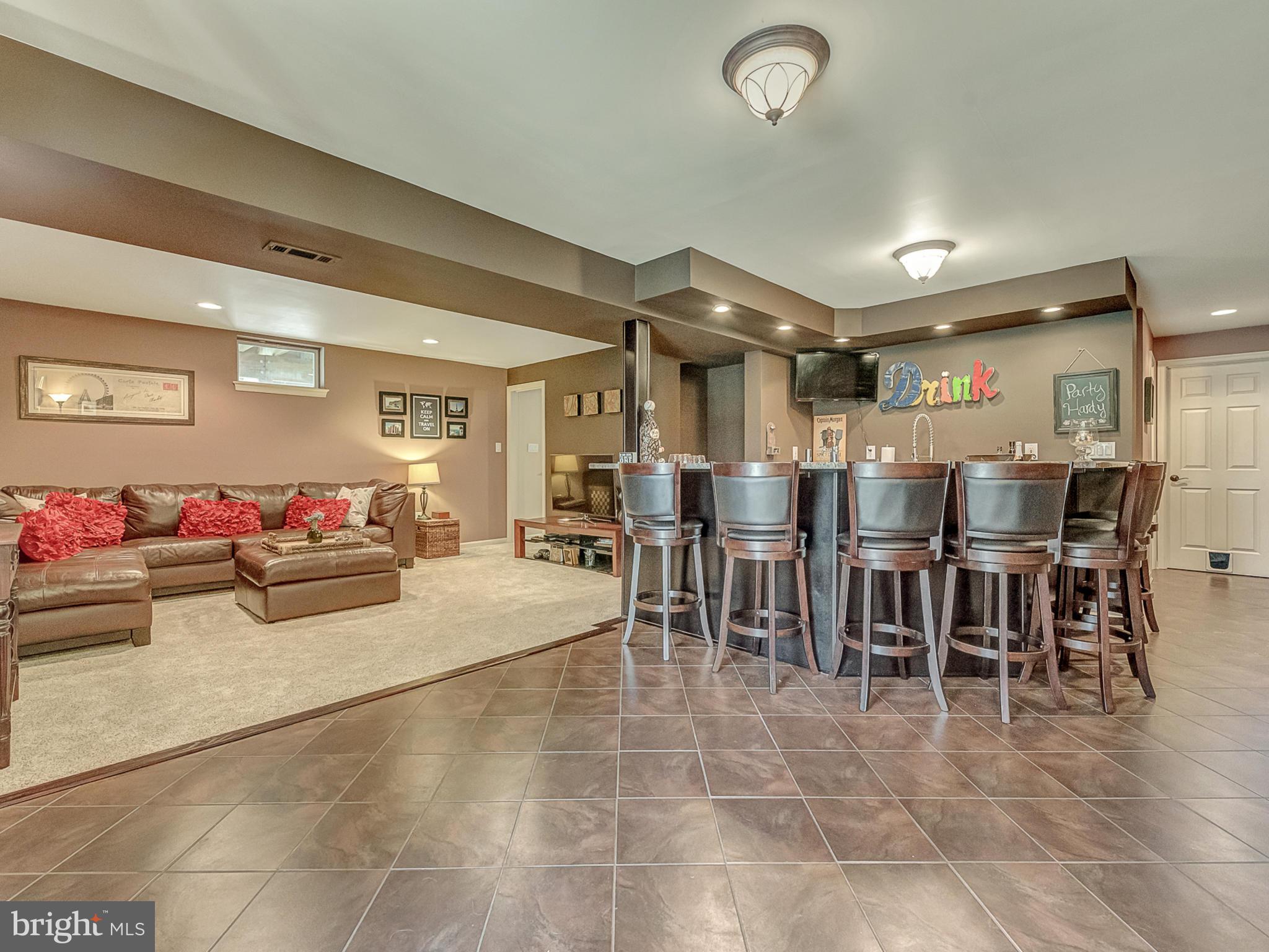 3364 Basford Road Frederick, MD 21703 - Photo 21 of 30 a lobby with furniture and a dining table