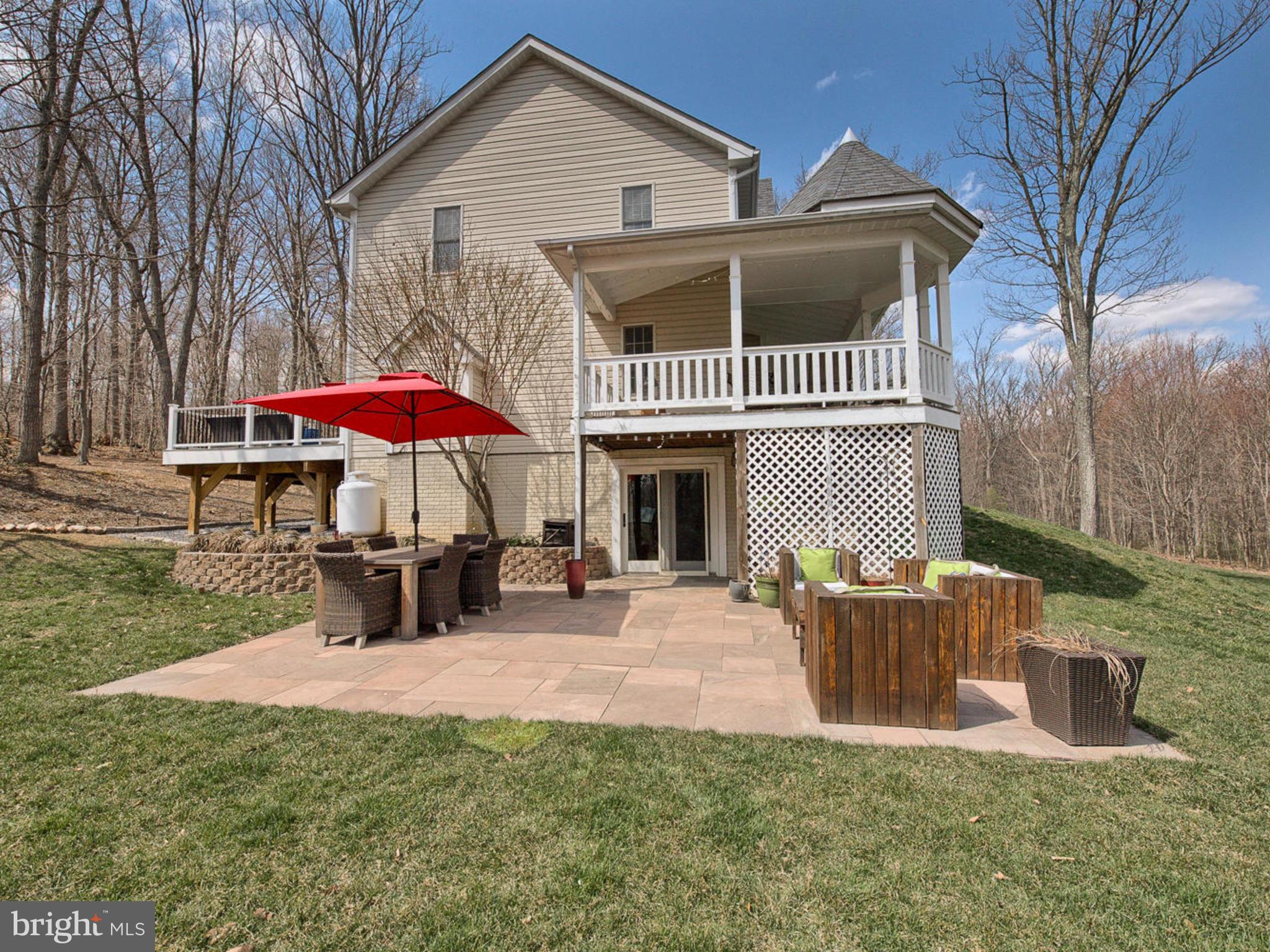 3364 Basford Road Frederick, MD 21703 - Photo 27 of 30 a view of a house with a porch and furniture