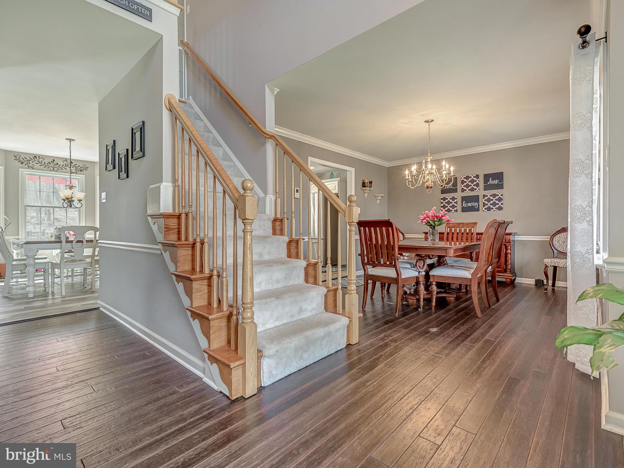 3364 Basford Road Frederick, MD 21703 - Photo 5 of 30 a view of entryway and dining room with wooden floor