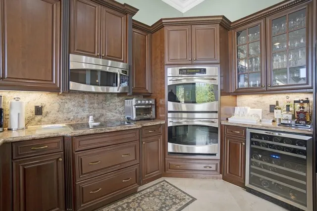 a kitchen with lots of counter space and dining table