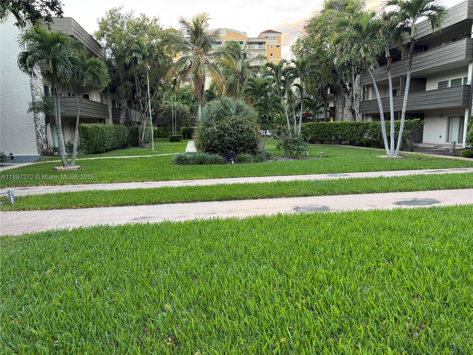 8315 Southwest 72nd Avenue, Unit 101B Miami, FL 33143 - Photo 16 of 18 a garden view